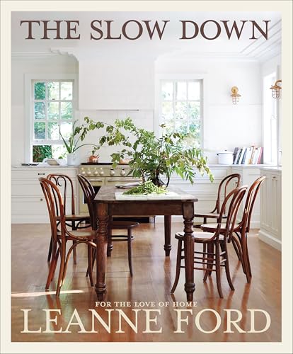 Book cover featuring a bright kitchen with a wooden table and chairs.