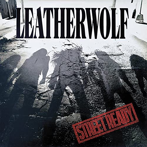 Album cover showing shadows of four people on cracked pavement with band and title text.