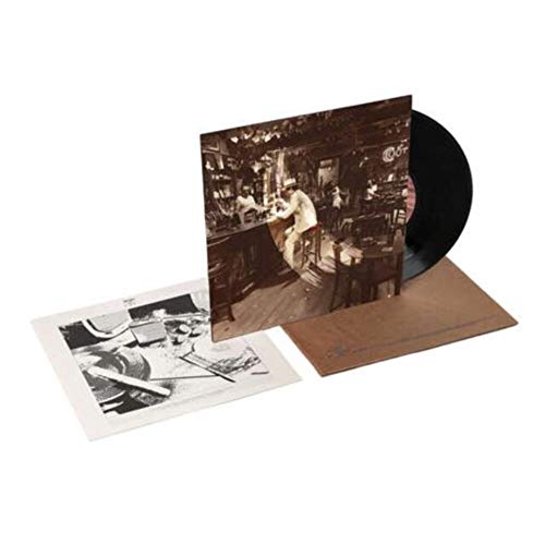 Led Zeppelin vinyl record with album cover, inner sleeve, and black disc on display.
