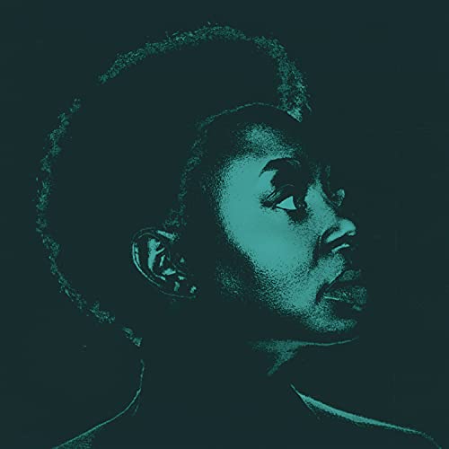 Close-up portrait of Ledisi in teal tones, album cover art.