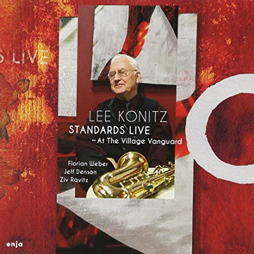 "Jazz album cover featuring Lee Konitz with a saxophone on a red background."