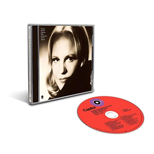 CD case with a black and white portrait of Peggy Lee, plus red CD.