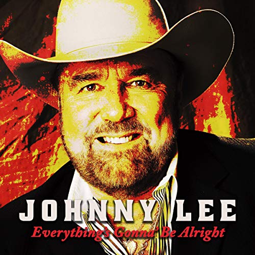 The image is a CD cover featuring a man wearing a cowboy hat and suit. Alt text: Man in cowboy hat and suit on album cover with text "Johnny Lee".