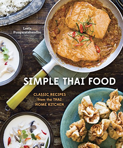Cookbook cover featuring Thai curry with salmon and other dishes.