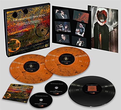 Legendary Pink Dots vinyl set with orange records and album artwork.