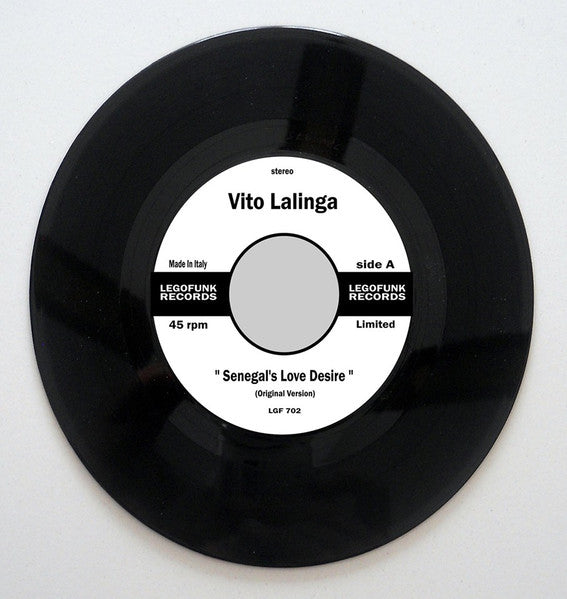 Black vinyl record with white label featuring text and logo details.