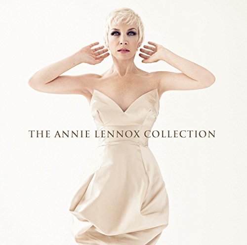 Annie Lennox album cover, portrait of a woman in a cream dress.