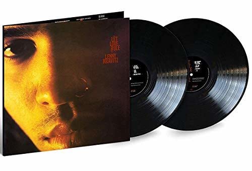 Lenny Kravitz Let Love Rule vinyl album cover and two black vinyl records.