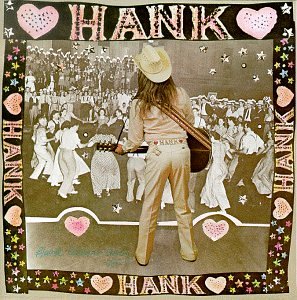 CD cover for Leon Russell’s “Hank Wilson’s Back” featuring a cowboy and dancers.