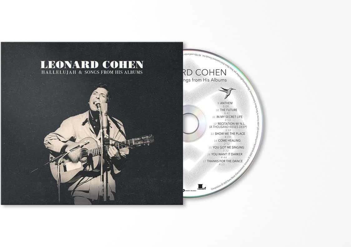 Leonard Cohen album cover: black and white photo of him playing guitar.