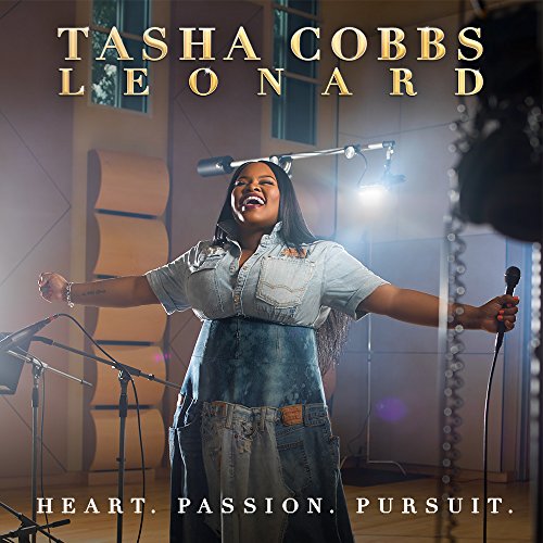 Tasha Cobbs Leonard album cover, woman singing with outstretched arms.