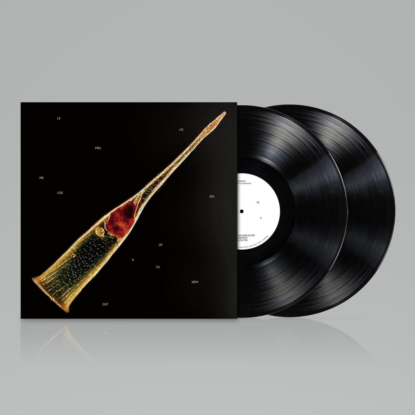 Leprous vinyl record with black cover and golden, abstract horn image.