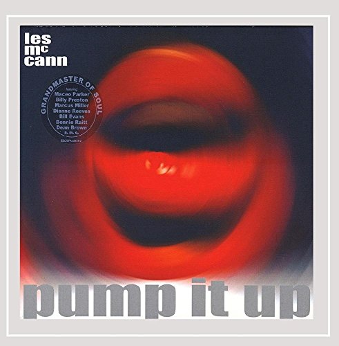 Les McCann “Pump It Up” CD cover with abstract red and black design.
