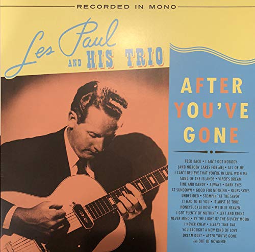 Vinyl album cover featuring Les Paul playing guitar, with tracklist on the right.