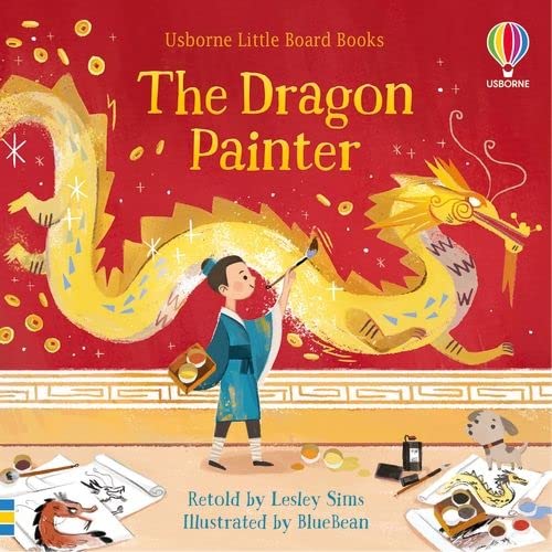 A child in blue robes paints a large yellow dragon on a red wall.