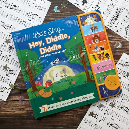 Open children's songbook with musical notes and illustrated cover art.