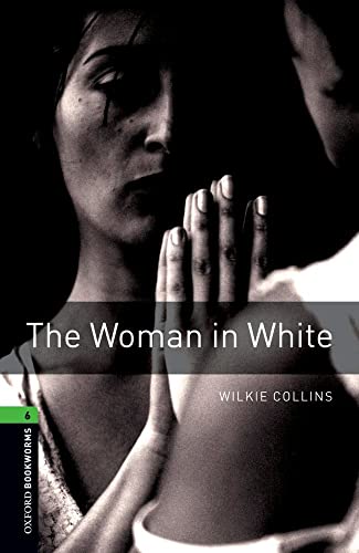 Book cover for "The Woman in White" featuring a distressed woman’s face.