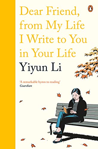 Book cover: woman reading on a bench with falling autumn leaves.