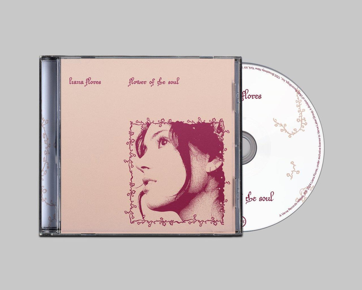 CD case with portrait of a woman and floral design.