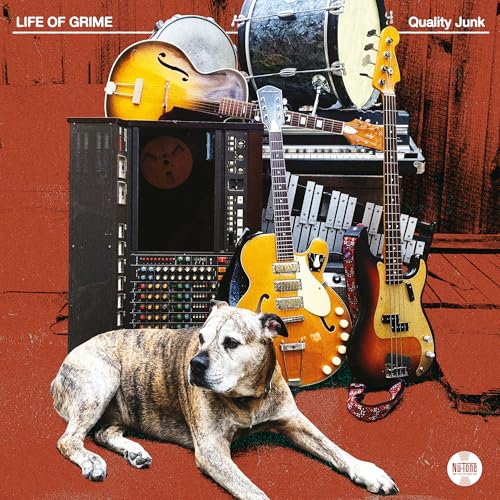 Album cover with musical instruments, a dog, and vintage electronics.