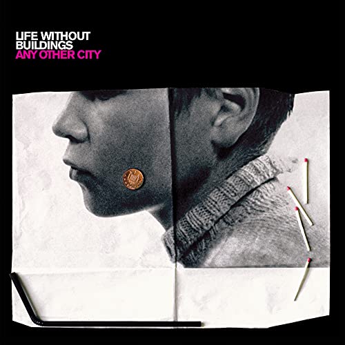 Black and white album cover featuring a face split with matches and a penny.