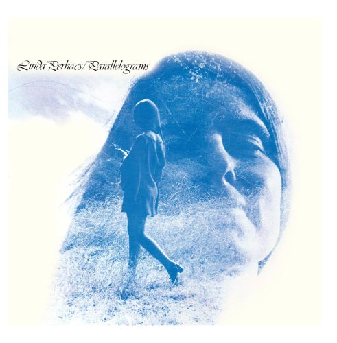 Blue-toned album cover featuring a woman’s face and a walking figure.