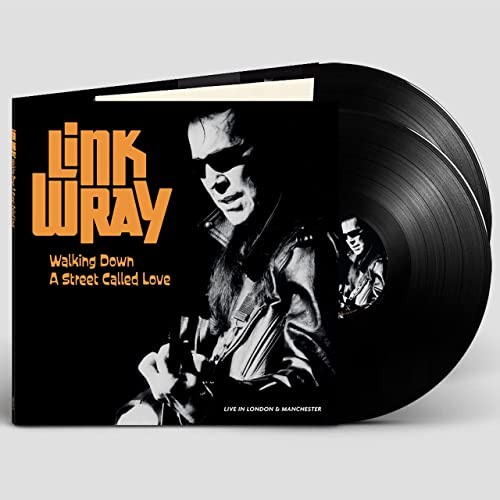 Link Wray vinyl record with black cover and portrait of the artist.