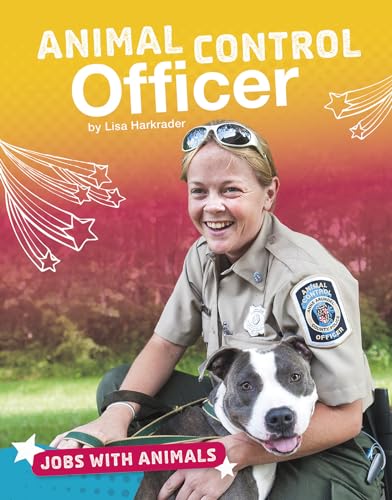 Animal control officer with a pit bull, smiling at the camera.