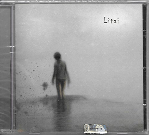 CD case with a blurred image of a child walking in water.