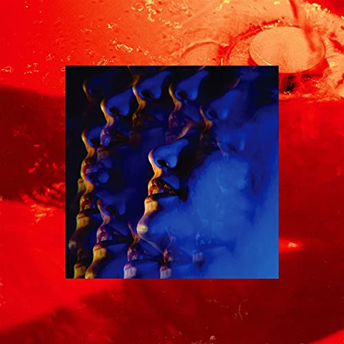 Vibrant red background with blue and yellow abstract image inset.