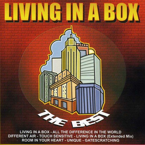 CD cover for “Living In A Box - The Best” with city illustration.