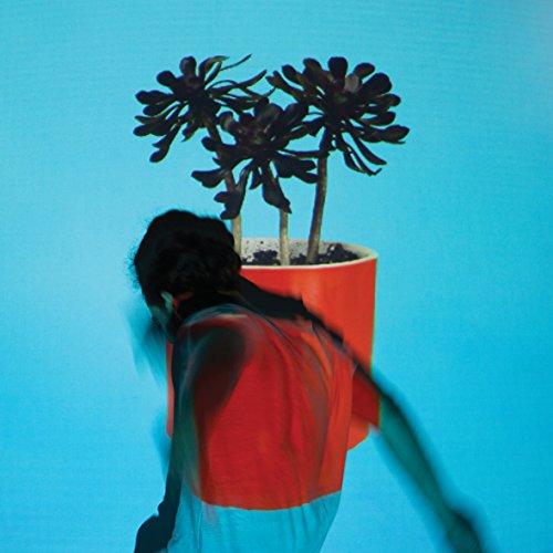 CD cover: person with plant growing from head, blue background.