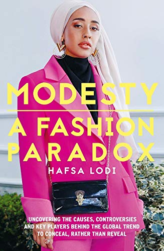 Book cover featuring a woman in hijab and pink suit, titled "Modesty: A Fashion Paradox".