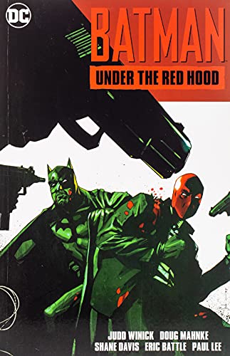 Batman and Red Hood stand together under a large gun on a comic cover.