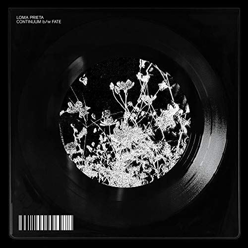 Black vinyl record sleeve with white floral design and barcode at the bottom.