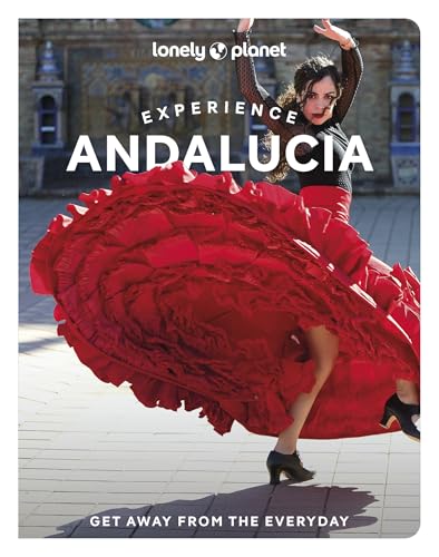 A woman in a black top and large red ruffled skirt dancing flamenco outdoors.