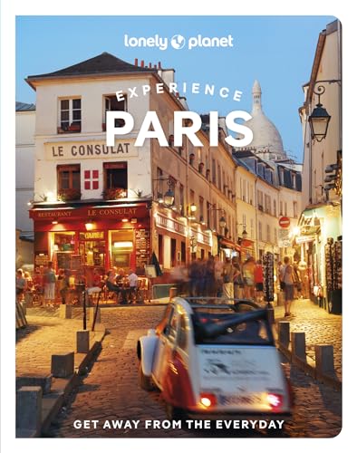 Lonely Planet guide to Paris with a street scene and vintage car.