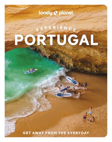 Lonely Planet Experience Portugal book cover featuring people kayaking and paddleboarding at a beach.