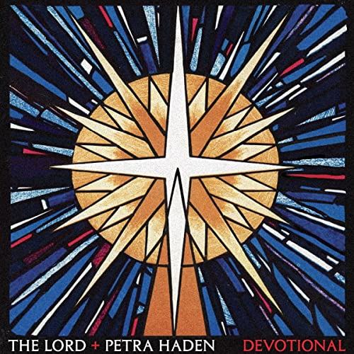 CD cover: Abstract stained-glass starburst design in gold, white, and blue.