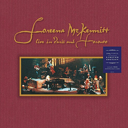 "Loreena McKennitt live album cover with red background and gold script, featuring a concert photo."