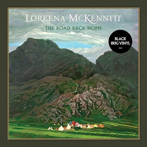Loreena McKennitt album cover featuring a mountainous landscape and village.