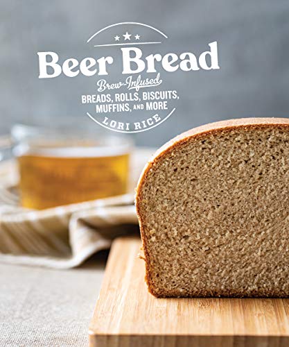 Cookbook cover featuring a sliced loaf of beer bread and honey.