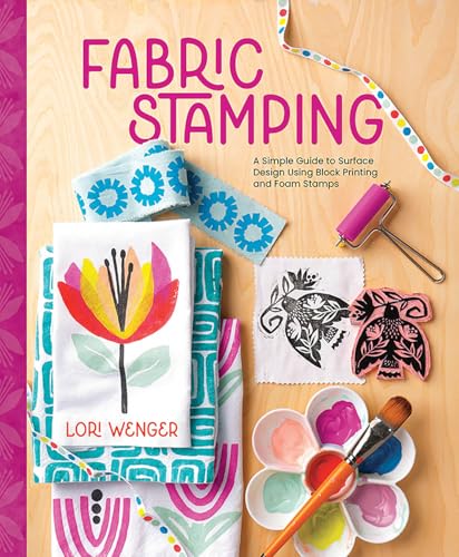 Book cover with fabric stamping examples, tools, and floral designs.