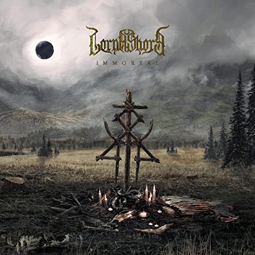 Lorna Shore “Immortal” album cover: dark landscape with a cross and fire.