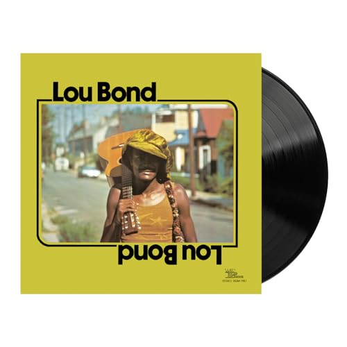 Lou Bond album cover with a musician and black vinyl record.
