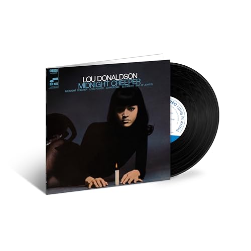 Lou Donaldson’s “Midnight Creeper” vinyl record with a woman’s portrait.