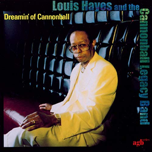Louis Hayes album cover: portrait of a man in a yellow suit.