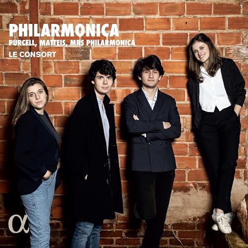 CD cover featuring four casually dressed musicians against a brick wall.