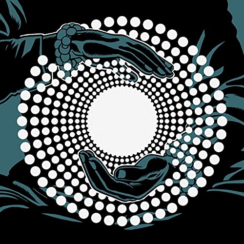 Dark teal hands framing a white, dotted circular design on black.
