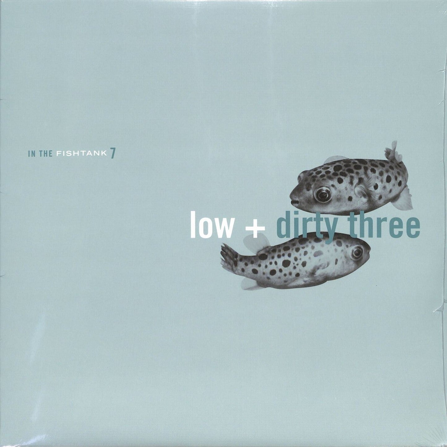Vinyl record cover: light blue background with pufferfish and text.